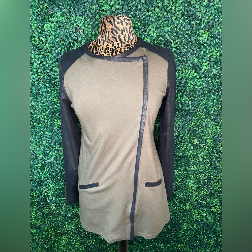 Fashionable asymmetric lightweight jacket with faux leather sleeves.